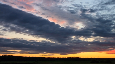 Cloud melts at sunset. Time Lapse